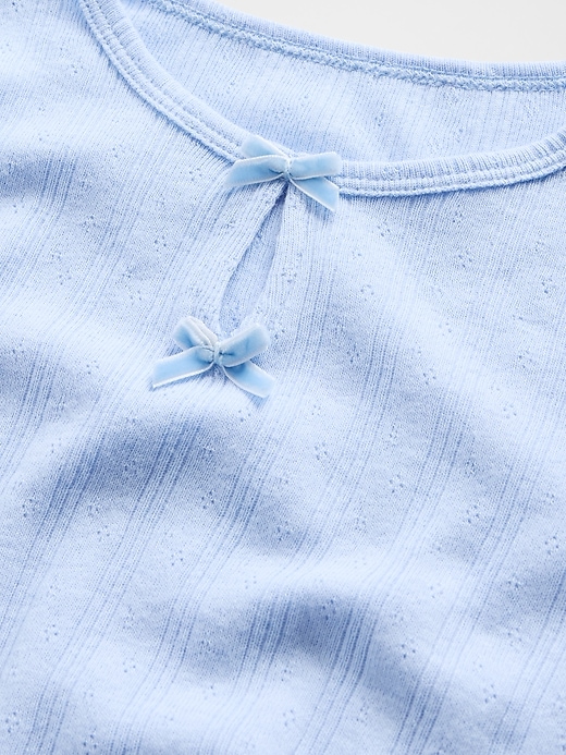 top con fiocco traforato per neonati e bambini piccoli