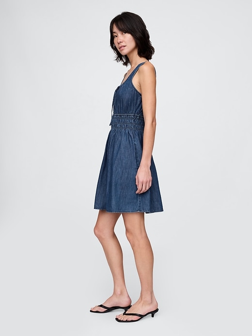 miniabito in denim con vita arricciata e nodo sul davanti