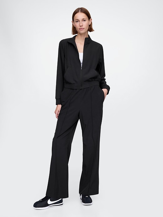pantaloni gapfit tech a vita alta con orlo diviso