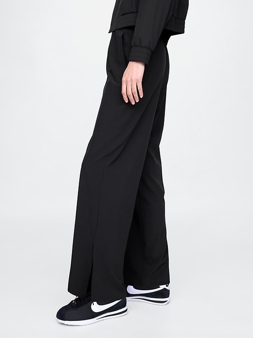 pantaloni gapfit tech a vita alta con orlo diviso