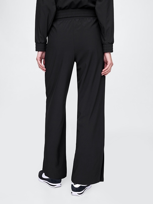 pantaloni gapfit tech a vita alta con orlo diviso