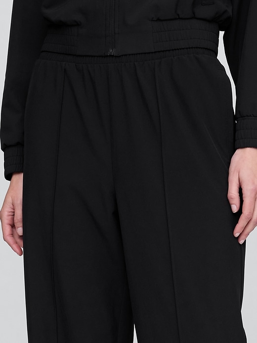 pantaloni gapfit tech a vita alta con orlo diviso