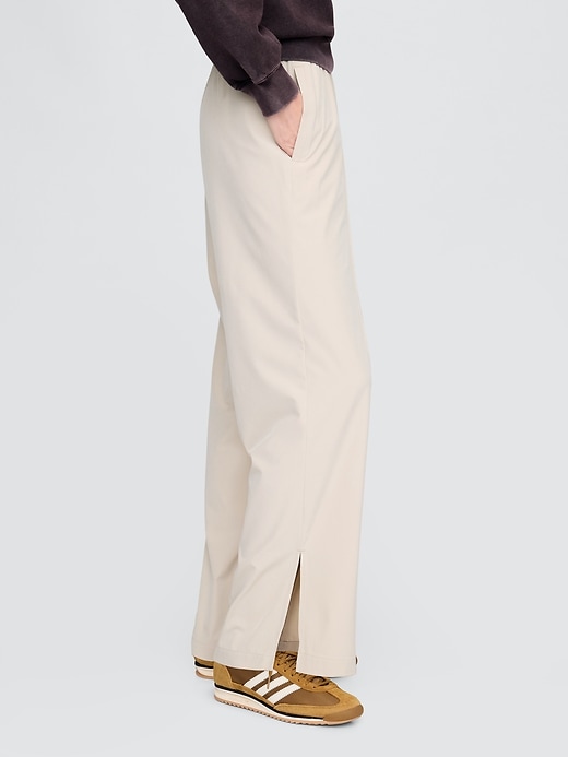 pantaloni gapfit tech a vita alta con orlo diviso