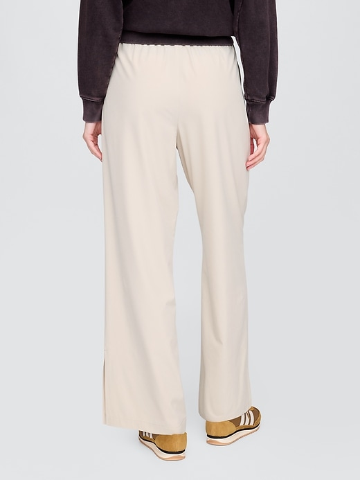 pantaloni gapfit tech a vita alta con orlo diviso