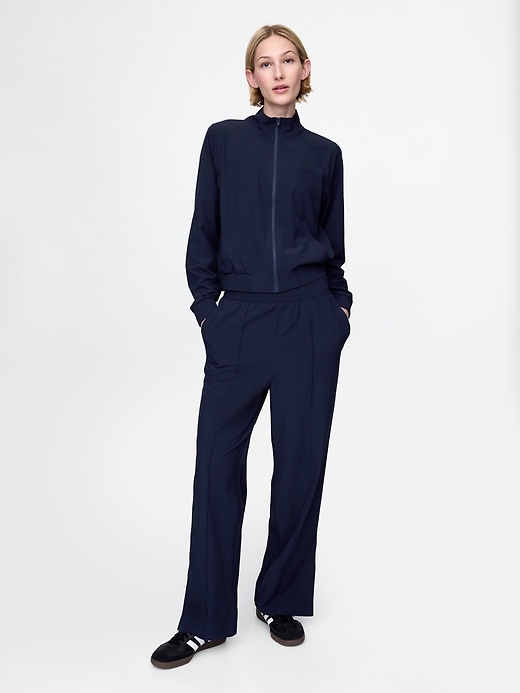 pantaloni gapfit tech a vita alta con orlo diviso