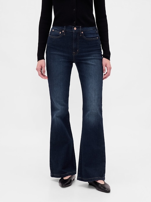 jeans a zampa anni 70 a vita alta