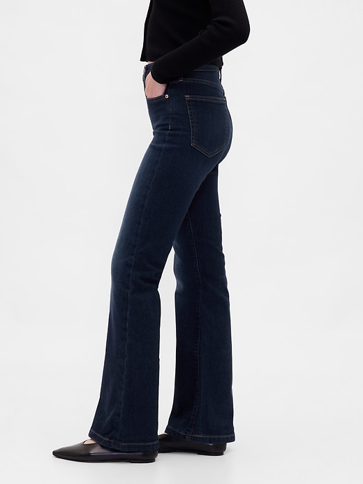 jeans a zampa anni 70 a vita alta