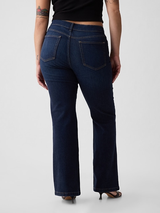 jeans a zampa anni 70 a vita alta