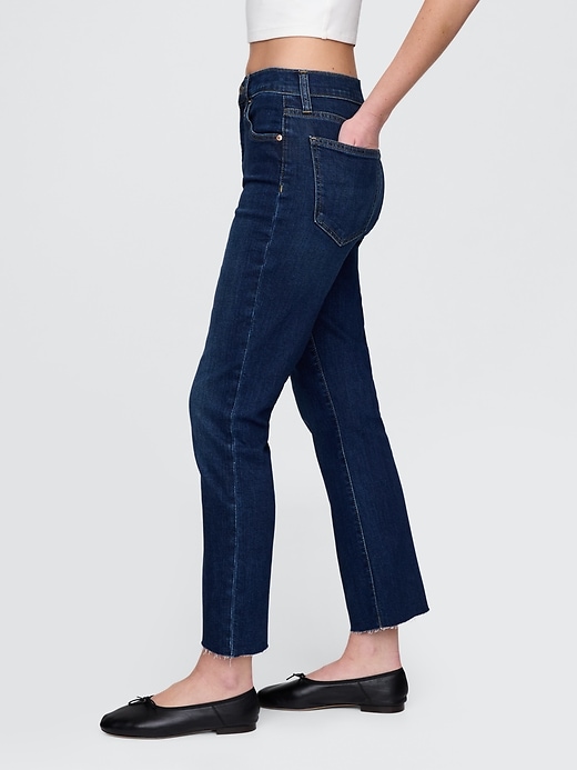 jeans a zampa a vita alta