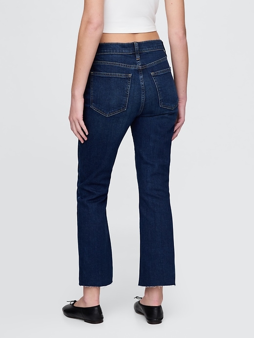 jeans a zampa a vita alta