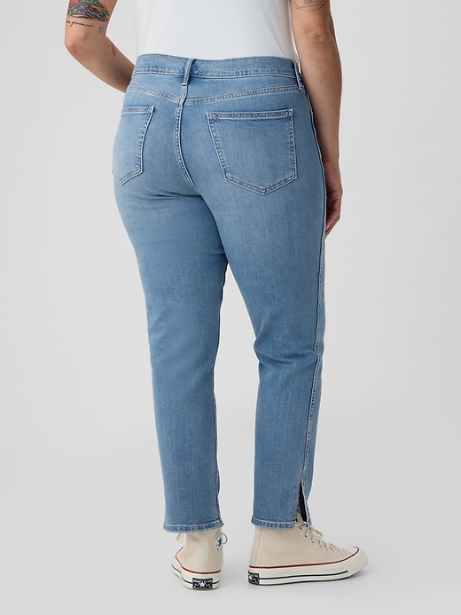 jeans vintage slim a vita media con orlo diviso