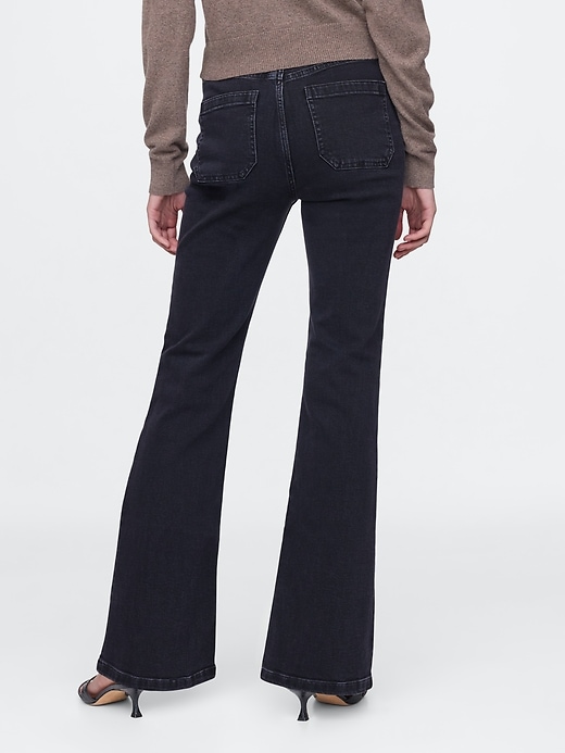 jeans a zampa anni 70 a vita alta