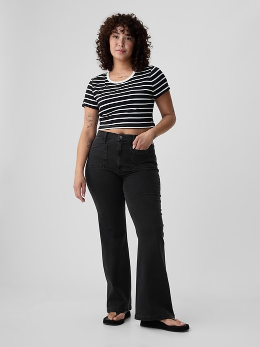 jeans a zampa anni 70 a vita alta