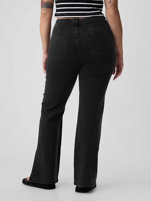 jeans a zampa anni 70 a vita alta