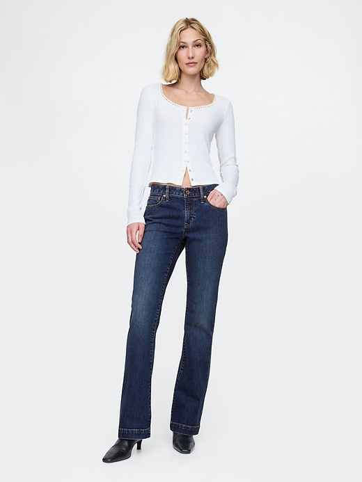 jeans lunghi e attillati a vita bassa