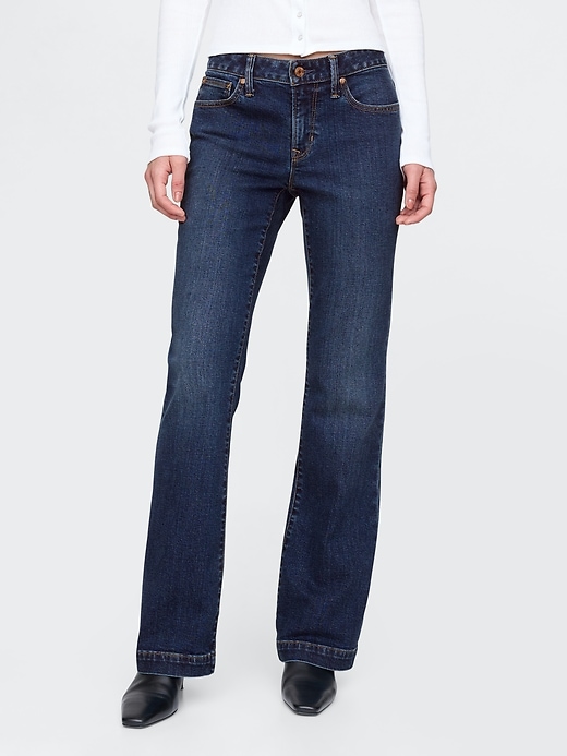 jeans lunghi e attillati a vita bassa