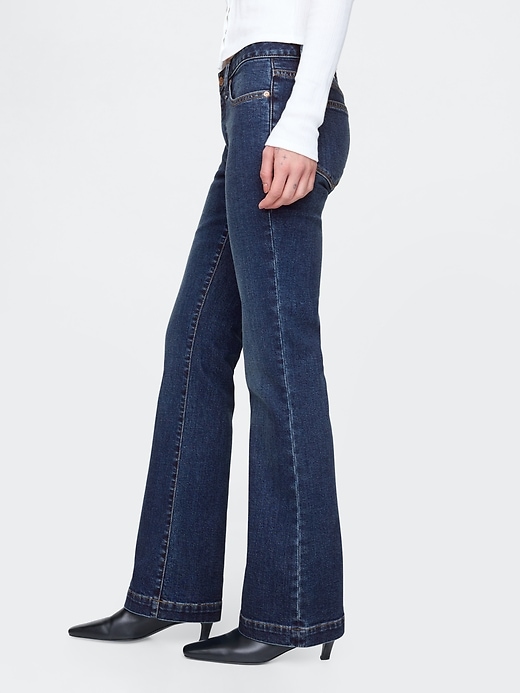 jeans lunghi e attillati a vita bassa
