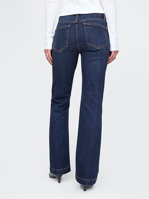jeans lunghi e attillati a vita bassa