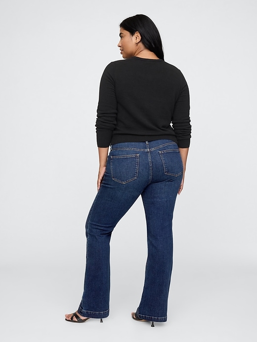 jeans lunghi e attillati a vita bassa