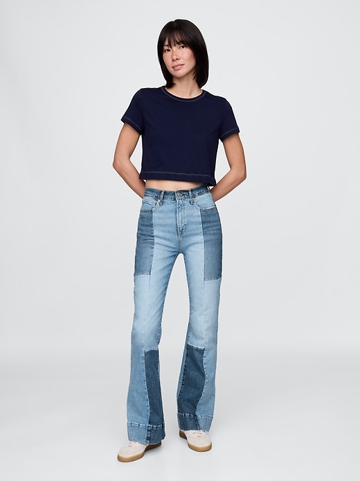 jeans a zampa patchwork anni 70 a vita alta