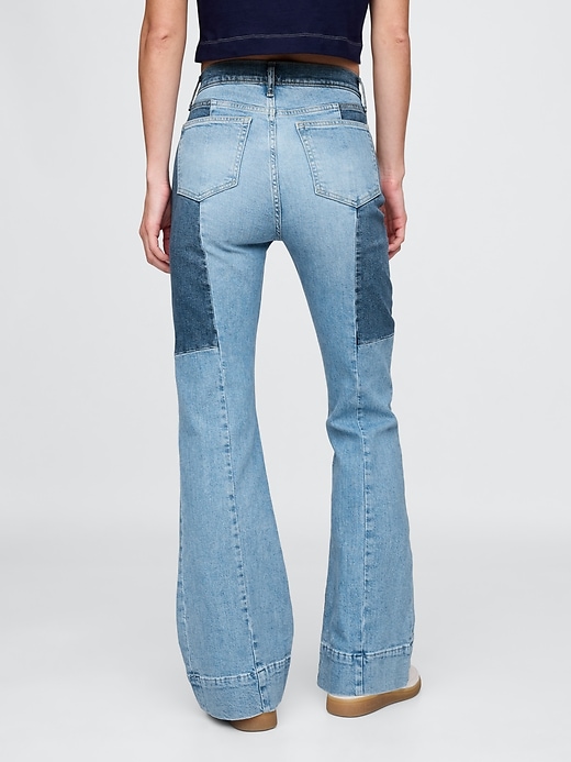 jeans a zampa patchwork anni 70 a vita alta