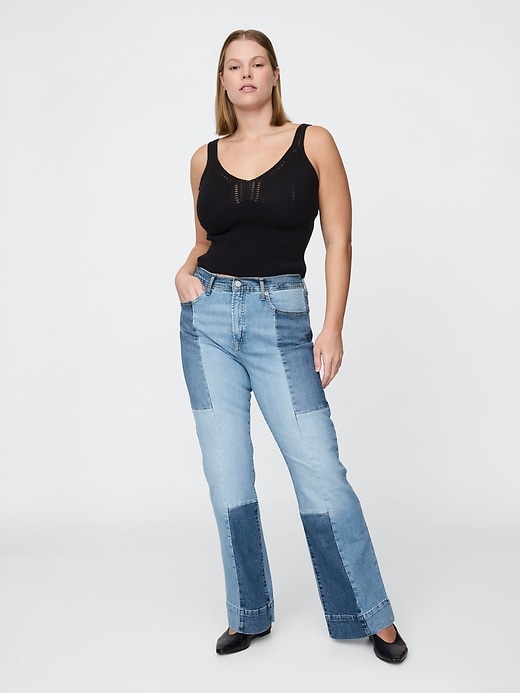 jeans a zampa patchwork anni 70 a vita alta