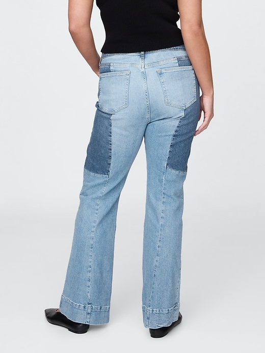jeans a zampa patchwork anni 70 a vita alta