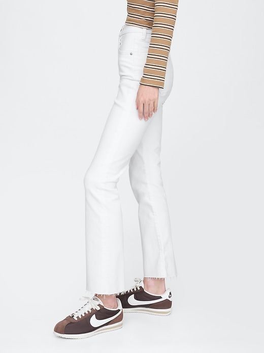 jeans a zampa a vita alta