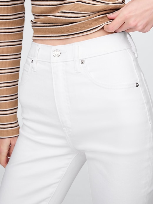 jeans a zampa a vita alta