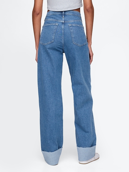 jeans larghi anni 90 con risvolto a vita media