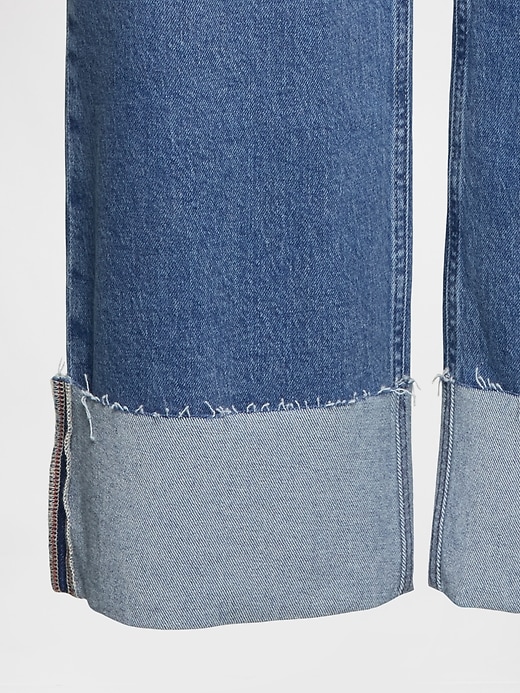 jeans larghi anni 90 con risvolto a vita media