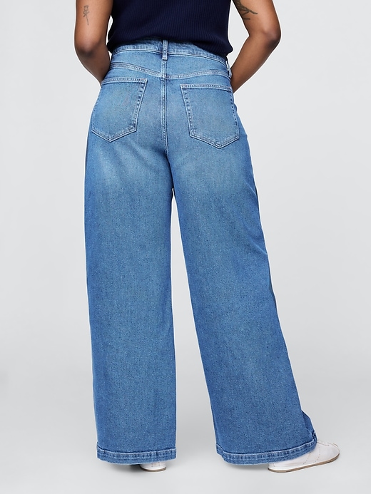 jeans a gamba larga stride a vita alta extra