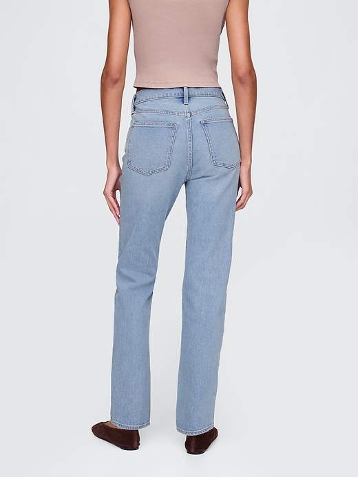 jeans dritti slim anni 90 a vita alta incrociati