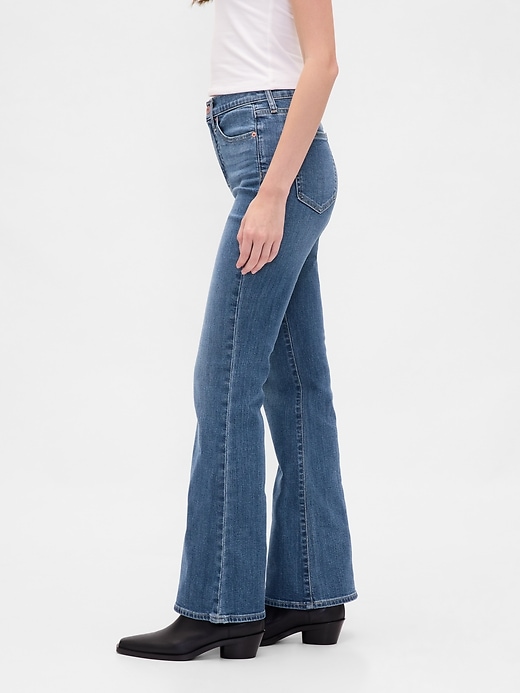 jeans a zampa anni 70 a vita alta