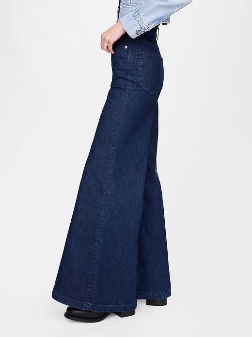 jeans a zampa a vita alta