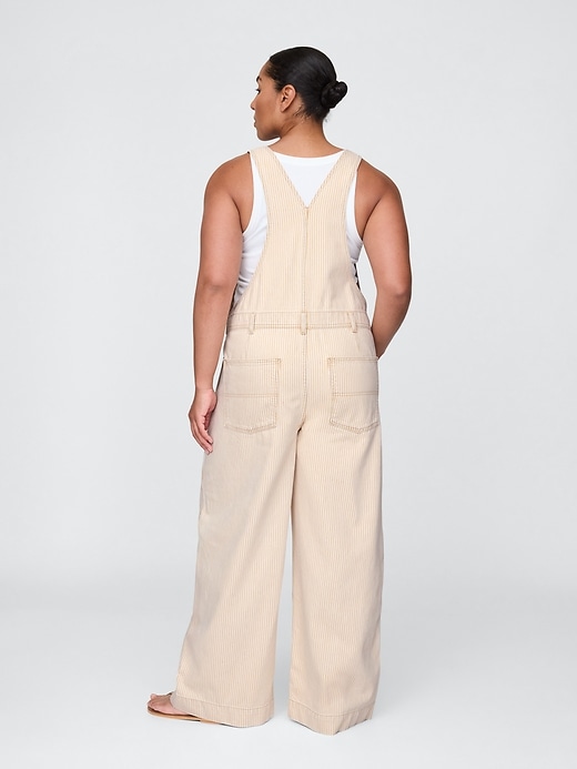 salopette larga in denim
