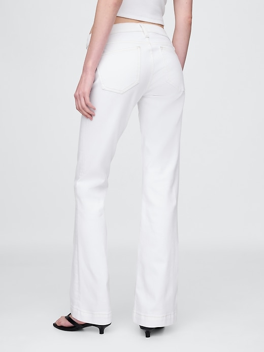 jeans lunghi e attillati a vita bassa