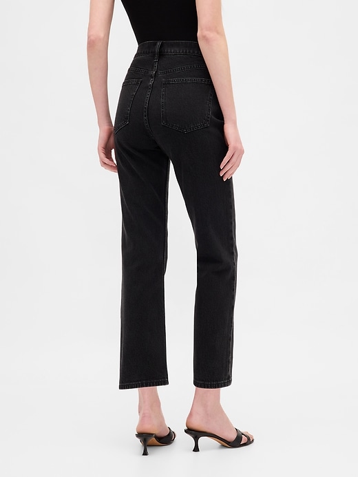 jeans aderenti e dritti a vita alta anni 90