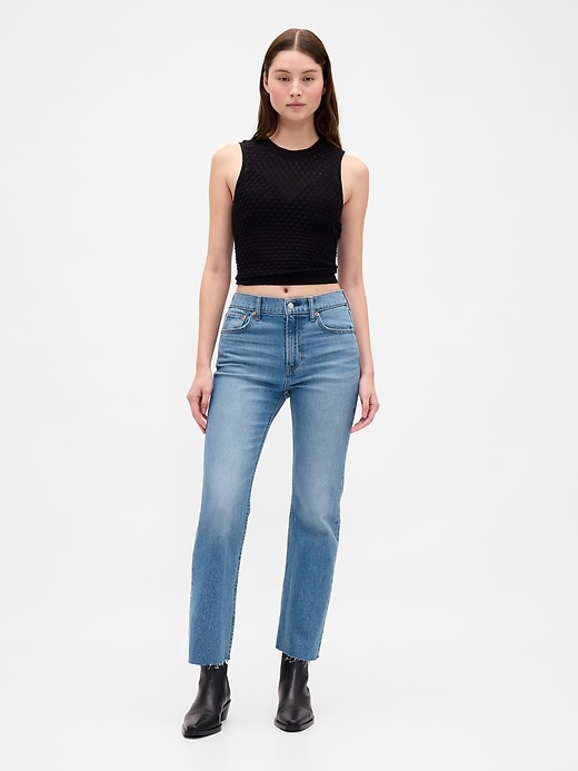 jeans aderenti e dritti a vita alta anni 90