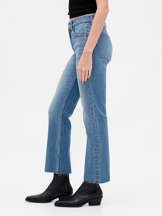 jeans aderenti e dritti a vita alta anni 90