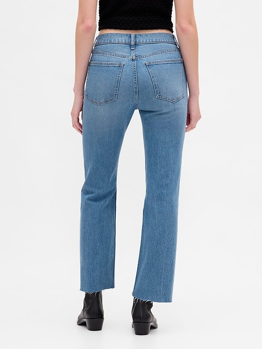 jeans aderenti e dritti a vita alta anni 90