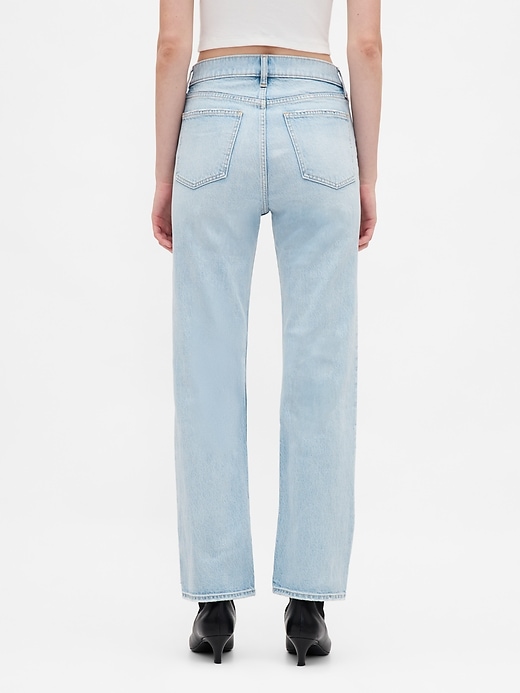 jeans aderenti e dritti a vita alta anni 90