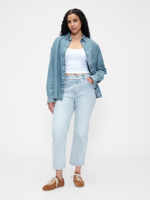 jeans aderenti e dritti a vita alta anni 90