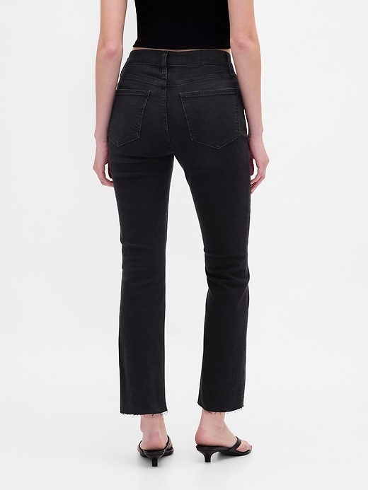 jeans a zampa a vita alta