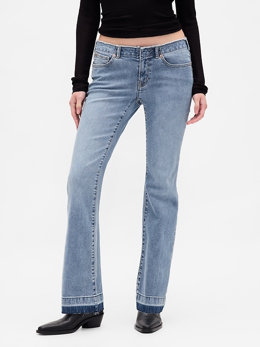 jeans lunghi e attillati a vita bassa