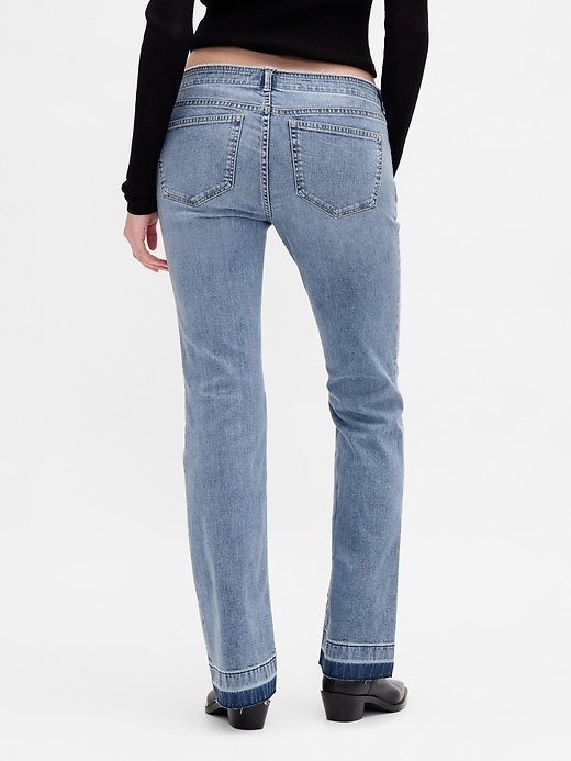 jeans lunghi e attillati a vita bassa