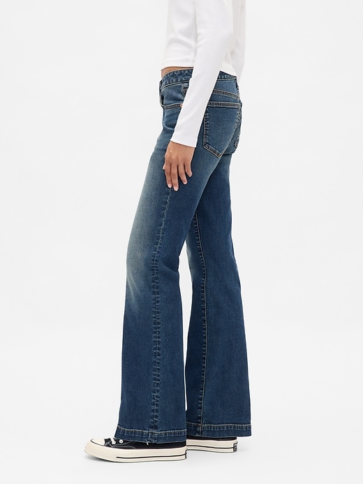 jeans lunghi e attillati a vita bassa
