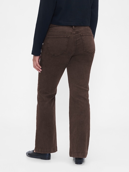 jeans lunghi e attillati a vita bassa