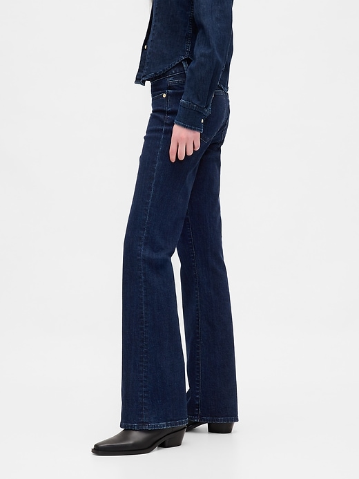 jeans lunghi e attillati a vita bassa