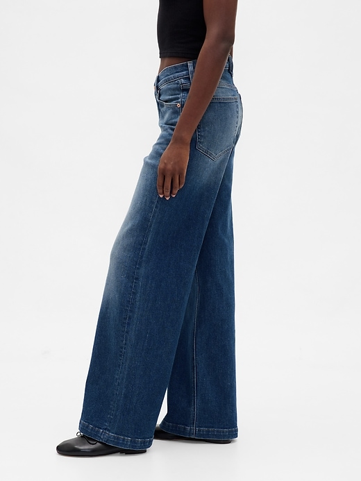 jeans a gamba larga con vita a v e vita alta stride
